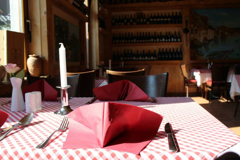 Laid table with a candle